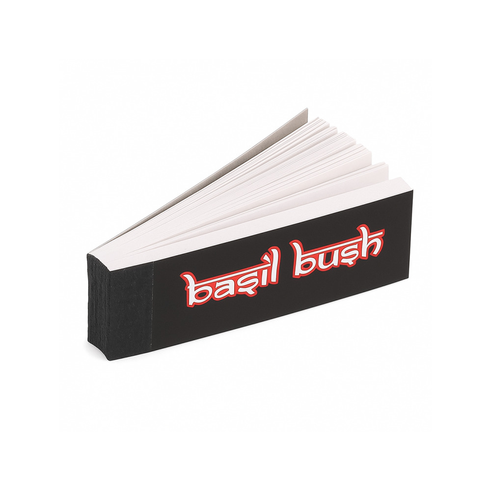 Basil Bush Regular Tips booklets fanned out on a rolling tray