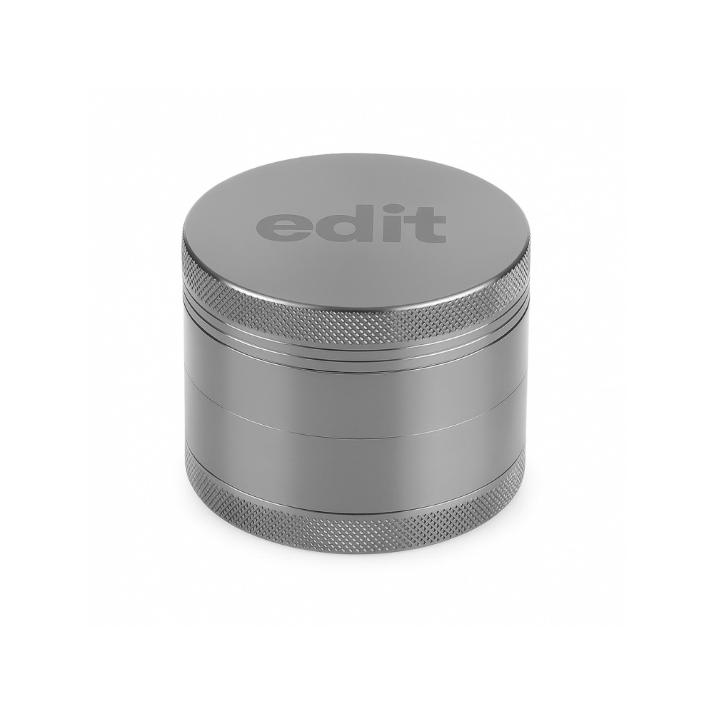 Close-up of diamond-cut teeth inside the EDIT gunmetal aluminium grinder lid