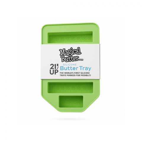 Magical Butter silicone butter tray showing four full-size stick moulds with tablespoon markings