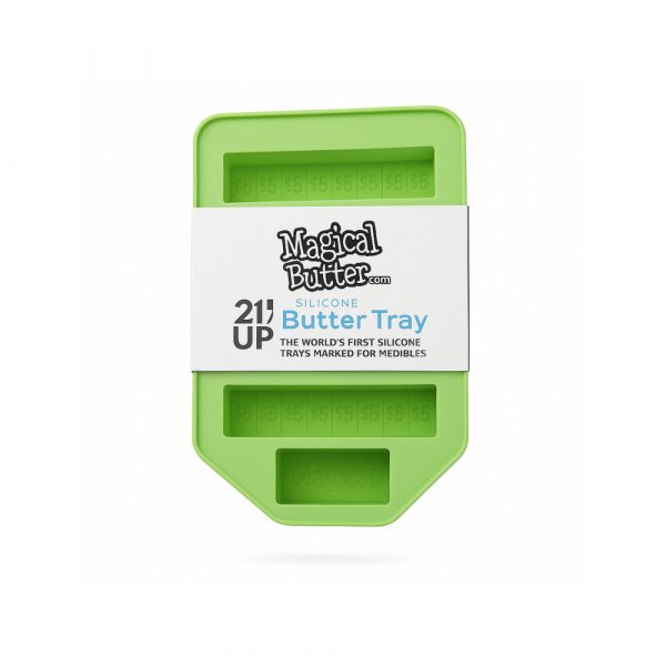 Magical Butter silicone butter tray showing four full-size stick moulds with tablespoon markings