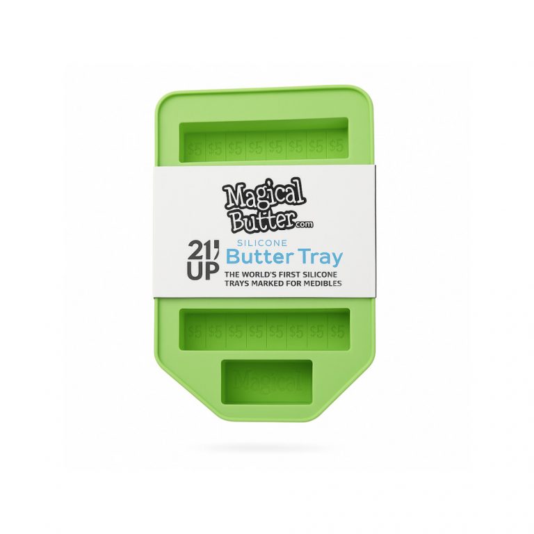 Magical Butter silicone butter tray showing four full-size stick moulds with tablespoon markings