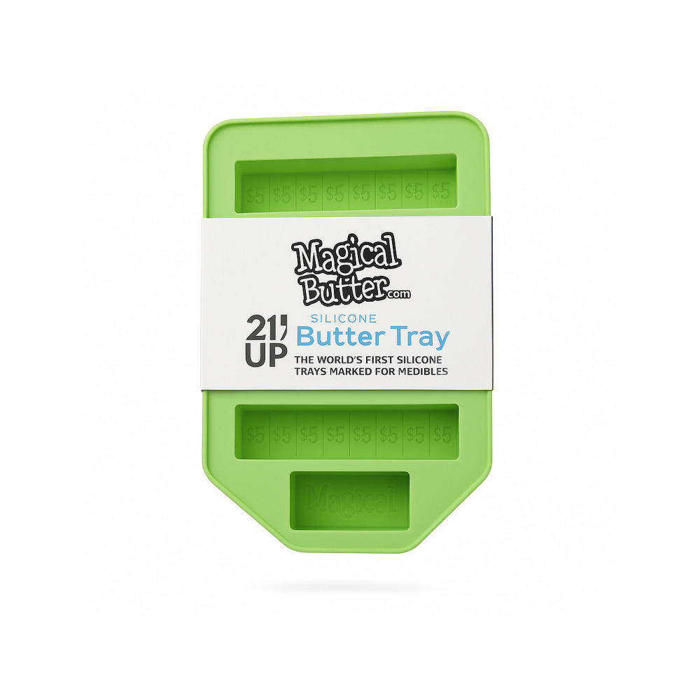 Magical Butter silicone butter tray showing four full-size stick moulds with tablespoon markings