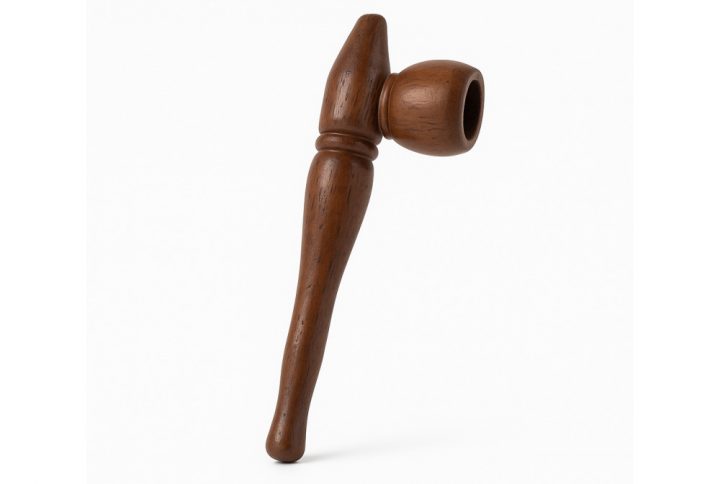 Small wooden smoking pipe for herb and tobacco shown from above on a plain background