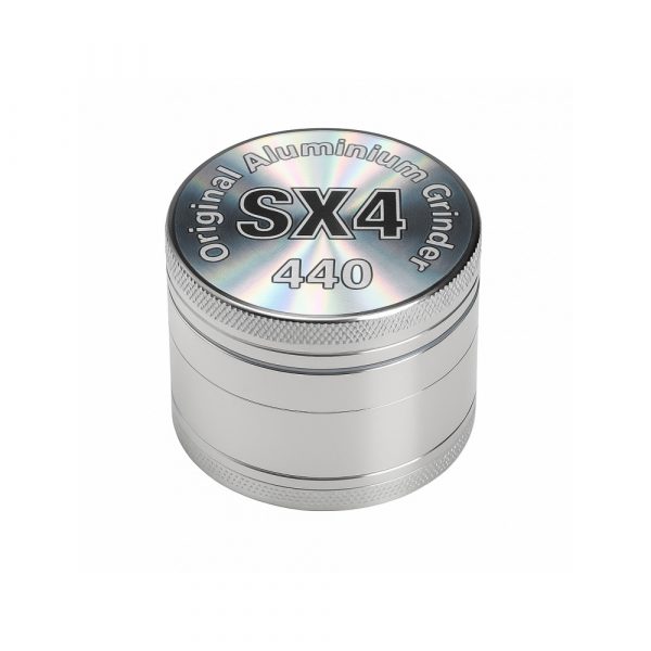 SX4 grinder disassembled showing all four chambers including kief catcher and mesh screen