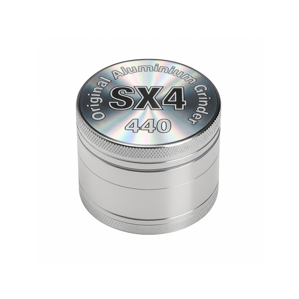 SX4 grinder disassembled showing all four chambers including kief catcher and mesh screen