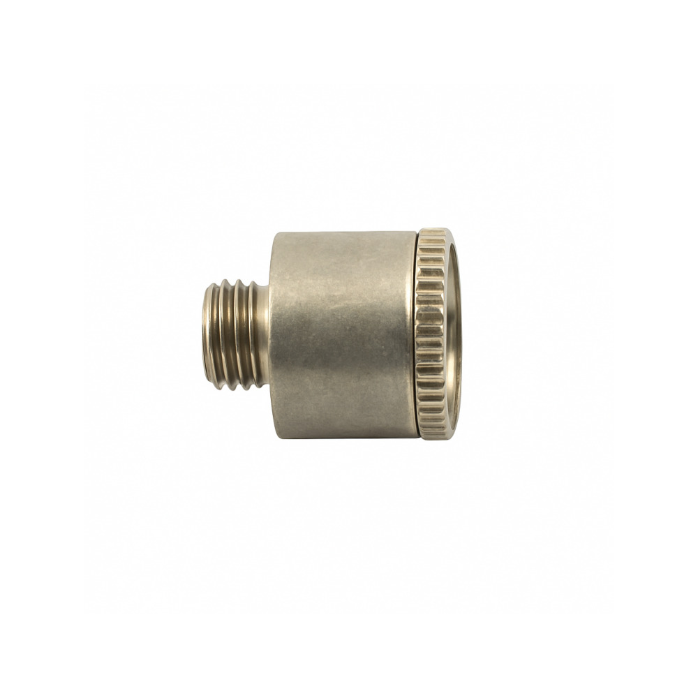 Windproof metal cone piece next to a standard metal pipe showing compatibility